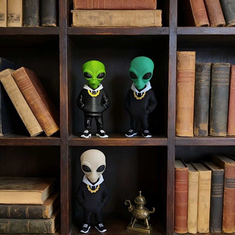 1 stuk groene alienfiguur met  - Desk Setup Home Office recensie en prijs