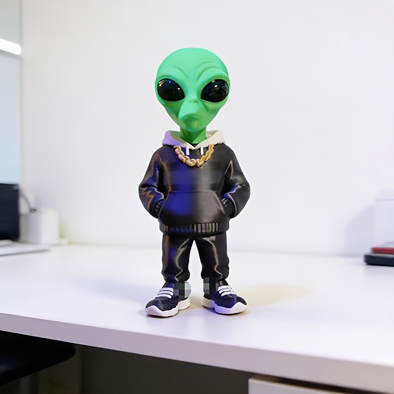 1 stuk groene alienfiguur met  - Desk Setup Home Office recensie en prijs